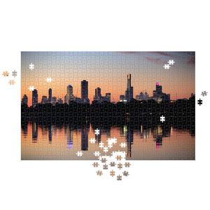 This puzzle will challenge you to put together the beautiful Melbourne skyline. Watch the sun set on the first day of winter over Albert Park Lake on June 1, 2016. Photographed by Darrian Traynor for Fairfax Medi...