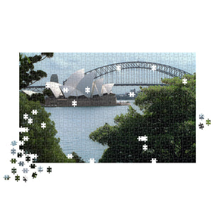 This puzzle puts a picturesque view of the Opera House and Harbour Bridge from Mrs Macquarie's Chair. A Sydney landmark, commissioned by Governor Macquarie for his wife Elizabeth who was known to love the scenery...